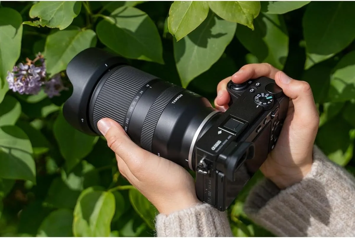 Tamron 18-300mm f/3.5-6.3 Di III-A VC VXD (Sony E) mounted on camera in shooting context